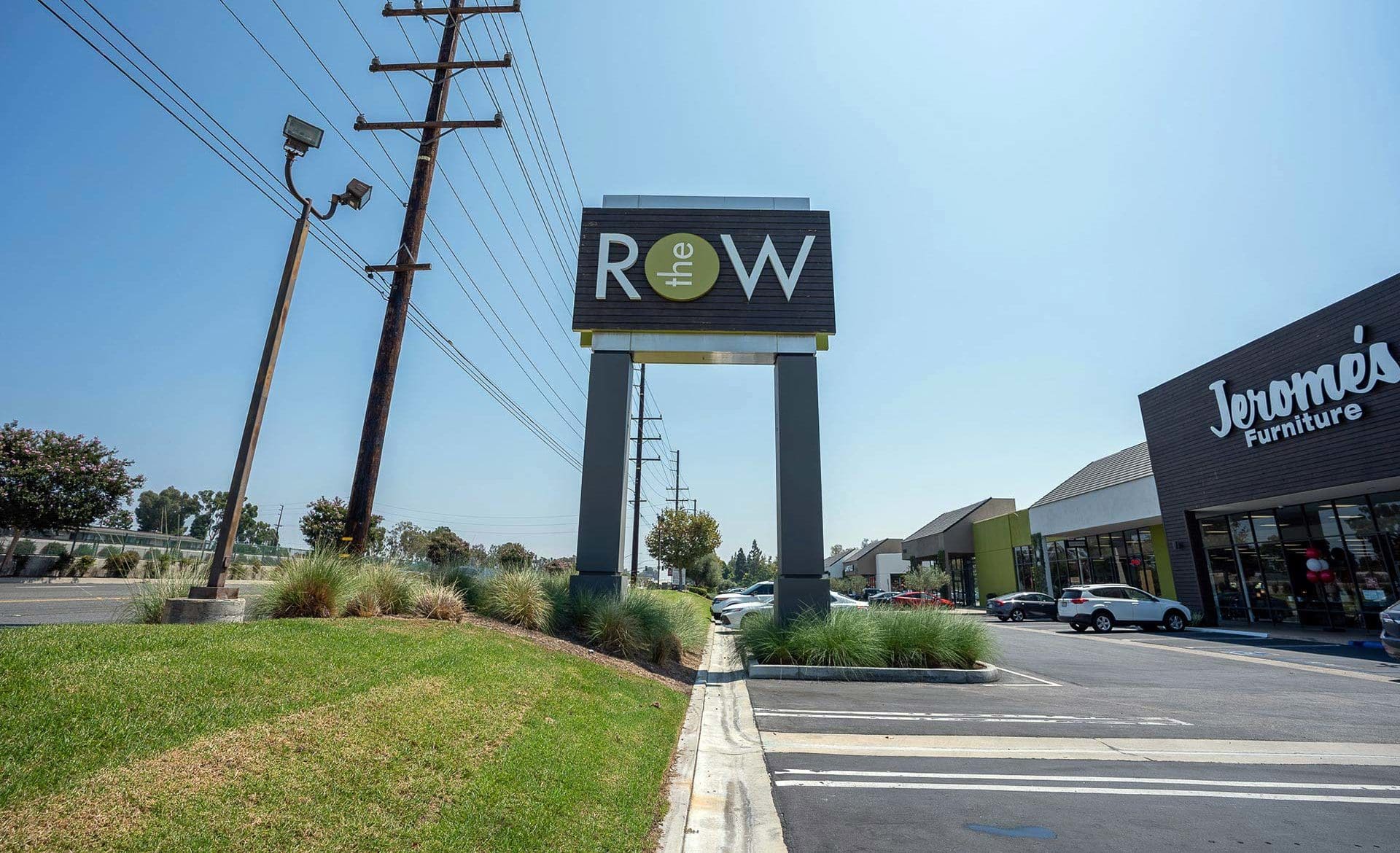 The Row logo large exterior road sign